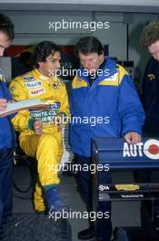 Nelson Piquet (BRA) Benetton talks with John Barnard (GBR)