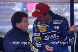 Nigel Mansell (GBR) talks with Patrick Head (GBR)