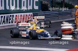 Riccardo Patrese (ITA) Williams FW14 Renault leads teammate Nigel Mansell (GBR) 2nd position