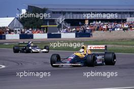Nigel Mansell (GBR) Williams FW 14 Renault 1st position