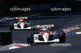 Gerhard Berger (AUT) McLaren MP4/6 Honda leads team mate Ayrton Senna da Silva (BRA)