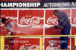 Ayrton Senna da Silva (BRA) 2nd position Nigel Mansell (GBR) Williams 1st position celebrate podium