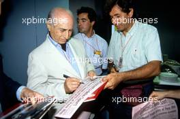 Juan Manuel Fangio (ARG) and journalist Pino Allievi