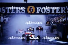 Ayrton Senna da Silva (BRA) McLaren MP4/6 Honda 1st position leads the group at start