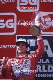 Ayrton Senna da Silva (BRA) McLaren Honda 2nd position celebrates on podium