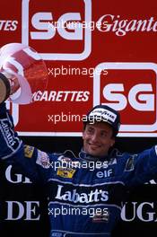 Riccardo Patrese (ITA) Williams 1st position celebrate podium