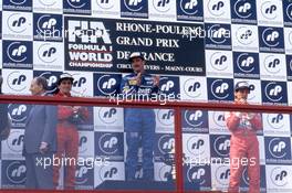 Alain Prost (FRA) Ferrari 2nd position Nigel Mansell (GBR) Williams 1st position Ayrton Senna (BRA) McLaren 3rd position celebrate podium