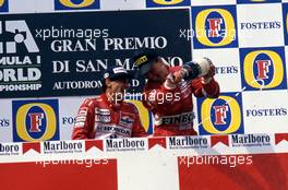 Ayrton Senna da Silva (BRA) McLaren  1st position and Jyrki Jarvilehto J J Lehto (FIN) Dallara 3rd position celebrates on podium