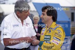 Nelson Piquet (BRA) Benetton talks with Ken Tyrrell (GBR)