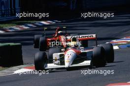 Ayrton Senna da Silva (BRA) McLaren MP4/6 Honda leads Alain Prost (FRA) Ferrari 643