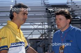 Flavio Briatore (ITA) talks with John Barnard (GBR) Benetton