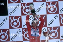 Ayrton Senna da Silva (BRA) McLaren 2nd position celebrate victory of World Championship with Champagne