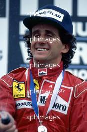 Alain Prost (FRA) Ferrari celebrate podium and 2nd position