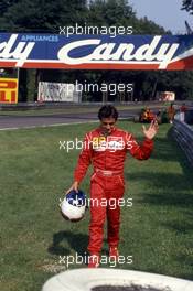 Jean Alesi (FRA) Ferrari back walk to pits