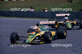 Johnny Herbert (GBR)  Lotus 102D Ford Cosworth leads team-mate Mika Hakkinen (FIN)