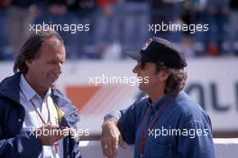Wison Fittipaldi (BRA) Minardi talks with Emerson Fittipaldi (BRA)