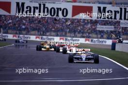 Riccardo Patrese (ITA) Williams FW14B Renault 2nd position leads a group
