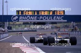 Nigel Mansell (GBR) Williams FW14B Renault 1st position leads team-mate Riccardo Patrese (ITA) 2nd position