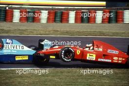 Jean Alesi (FRA) Ferrari F92AT crash with Emanuele Naspetti (ITA) March CG911B Ilmor