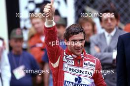 Ayrton Senna da Silva (BRA) McLaren 1st position celebrates victory