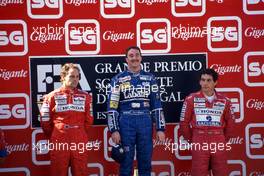 Gerhard Berger (AUT) McLaren 2nd position Nigel Mansell (GBR) Williams 1st position Ayrton Senna da Silva (BRA) McLaren 3rd position celebrate podium