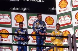 Riccardo Patrese (ITA) Williams 2nd position Nigel Mansell (GBR) Williams 1st position Michael Schumacher (GER) Benetton 3rd position celebrate podium