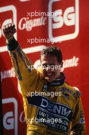 Michael Schumacher (GER) Benetton 1st position celebrates on podium