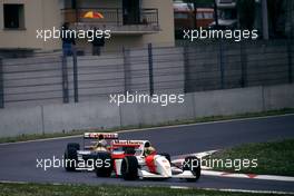 Ayrton Senna da Silva (BRA) McLaren MP4/8 Ford Cosworth leads Alain Prost (FRA) Williams FW15C Renault 1st position
