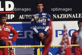 Damon Hill (GBR) Williams 1st position celebrates on podium