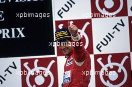 Ayrton Senna da Silva (BRA) McLaren 1st position celebrates victory on podium