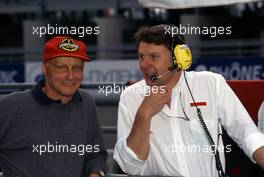 Niki Lauda (AUT) talks with John Barnard (GBR) Ferrari
