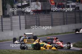 Michael Schumacher (GER) Benetton B193B Ford Cosworth 2nd position battles with Gerhard Berger (AUT) Ferrari F93A