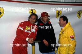 Gerhard Berger (AUT) Ferrari talks with Niki Lauda (AUT) and Jean Todt (FRA)