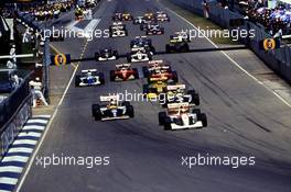 Ayrton Senna da Silva (BRA) McLaren MP4/8 Ford Cosworth 1st position leads the group at start