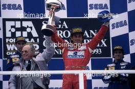 Damon Hill (GBR) Williams 2nd position Ayrton Senna da Silva (BRA) McLaren 1st position Alain Prost (FRA) Williams 3rd position celebrates on podium