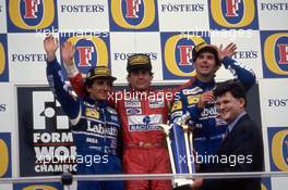 Alain Prost (FRA) Williams 2nd position Ayrton Senna da Silva (BRA) McLaren 1st position Damon Hill (GBR) Williams 3rd position celebrates on podium