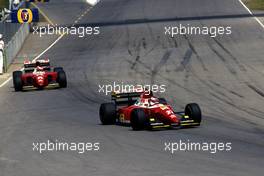 Jean Alesi (FRA) Ferrari F93A leads team-mate Gerhard Berger (AUT)