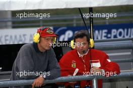 Niki Lauda (AUT) talks with Jean Todt (FRA) Ferrari