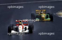 Ayrton Senna da Silva (BRA) McLaren MP4/8 Ford Cosworth 1st position leads Michael Schumacher (GER) Benetton B193 Ford Cosworth 3rd position