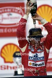 Ayrton Senna da Silva (BRA) McLaren 1st position celebrates on podium