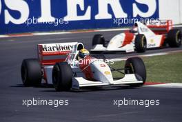 Ayrton Senna da Silva (BRA) McLaren MP4/8 Ford Cosworth 1st position leads teammate Michael Andretti (USA)