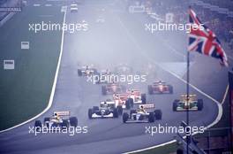 Alain Prost (FRA) Williams F15C Renault 3rd position leads the group at start