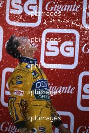 Michael Schumacher (GER) Benetton 1st position celebrates on podium