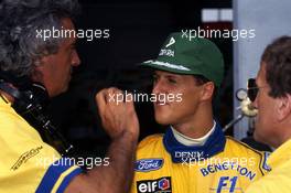 Michael Schumacher (GER) Benetton talks with Flavio Briatore (ITA)