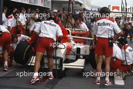 Michael Andretti (USA) McLaren MP4/8 Ford Cosworth 2nd position during a pit stop