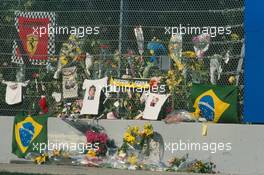 Tribute to Ayrton Senna da Silva (BRA). Flowers at the Tamburello corner