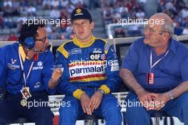 Cesare Fiorio (ITA) talks with Olivier Panis (FRA) and Guy Ligier (FRA)