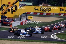 Gerhard Berger (AUT) Benetton B196 Renault Mild Seven Benetton Renault 3rd position lead a group