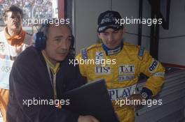 Andrea Montermini (ITA) talks with Paolo Guerci (ITA) Forti Corse