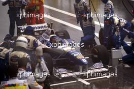 Jacques Villeneuve (CDN) Williams FW18 Renault Rothmans Williams Renault 3rd position during a pit stop